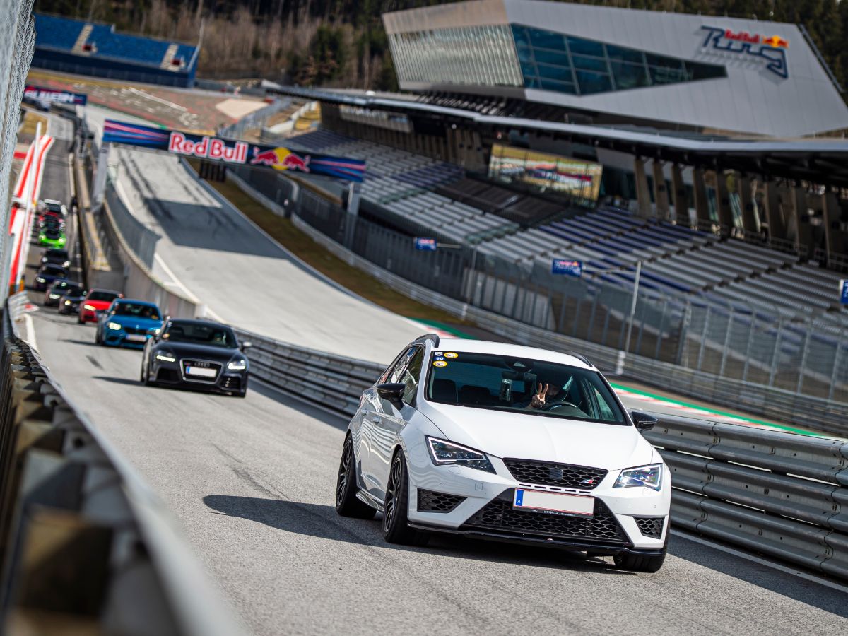 Cars driving in the pitlane