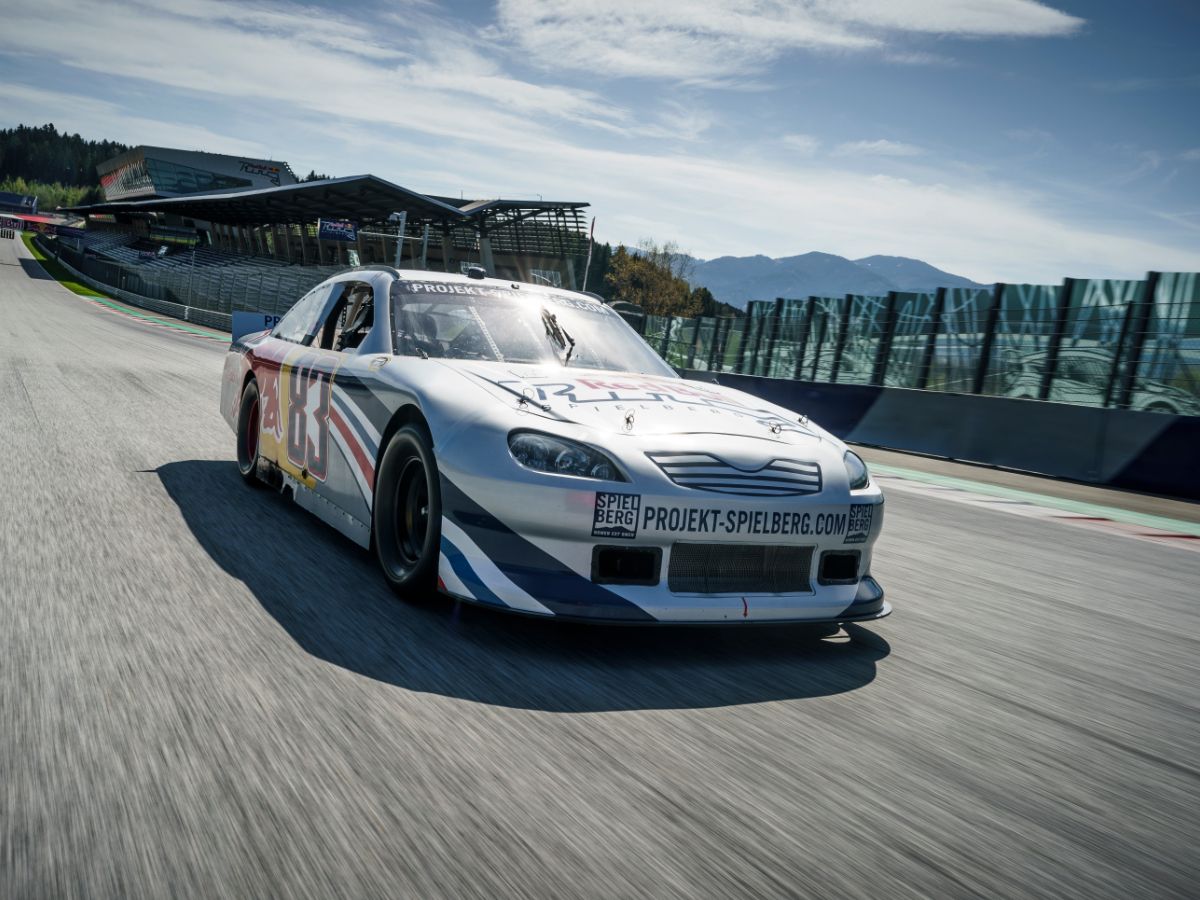 Nascar driving on a straightaway