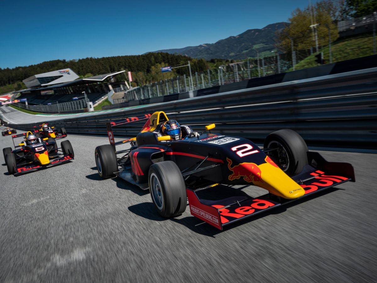 Formula 4 car races on track