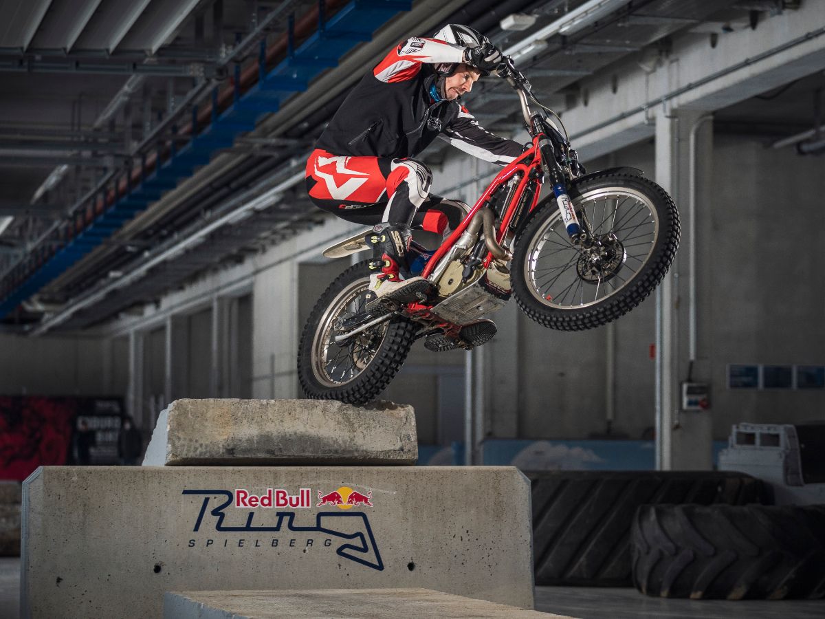 Trial Bike jumping over obstacle