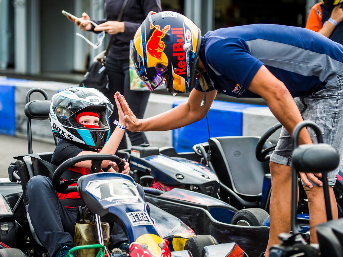 Kart Driver high fiving