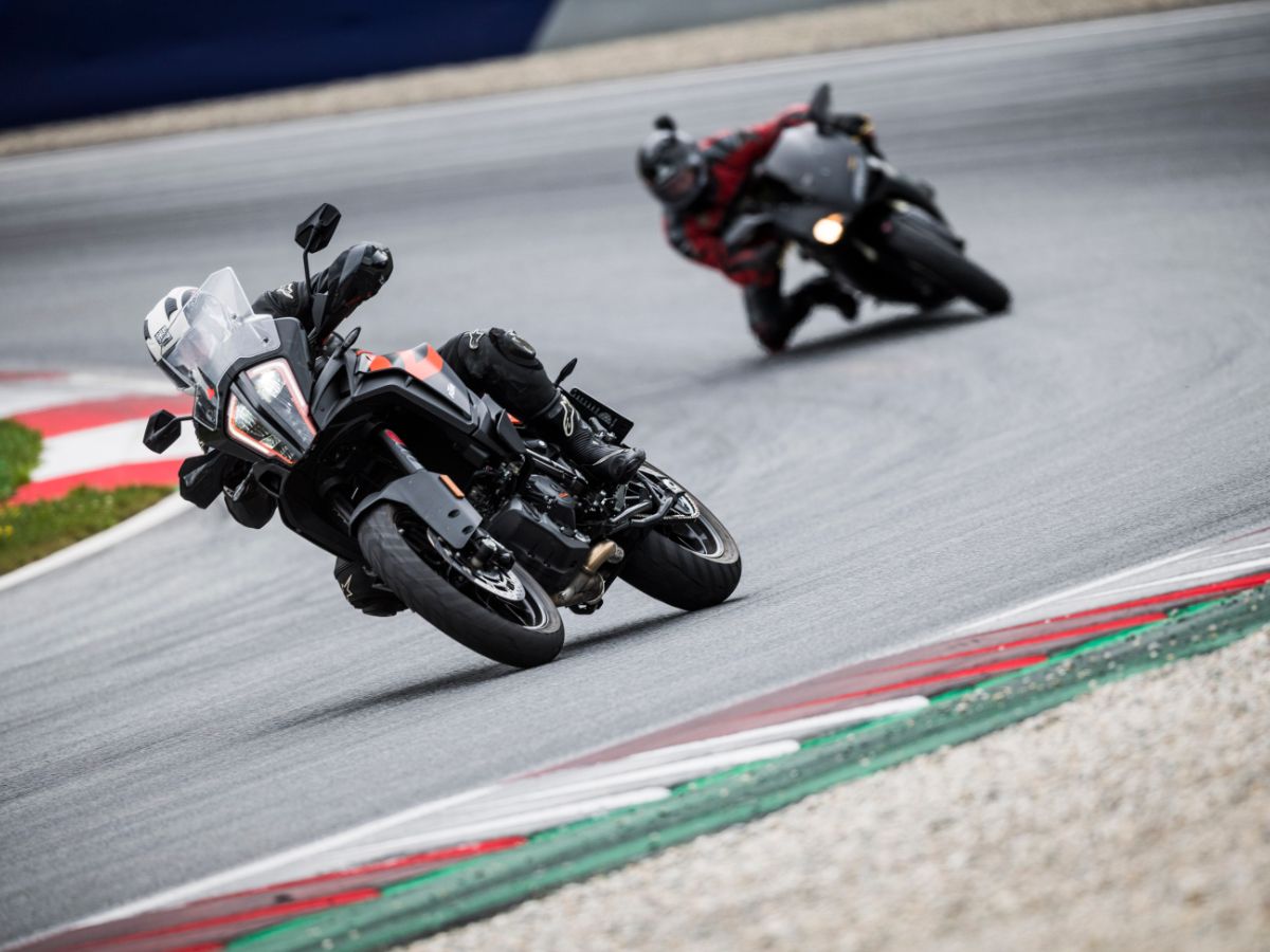 Bikers leaning into the curve