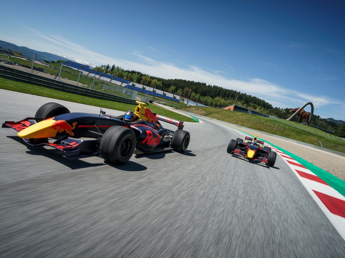 Formula 4 Car overtaking on track