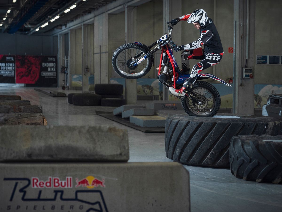 Trial Bike standing on a massive tyre