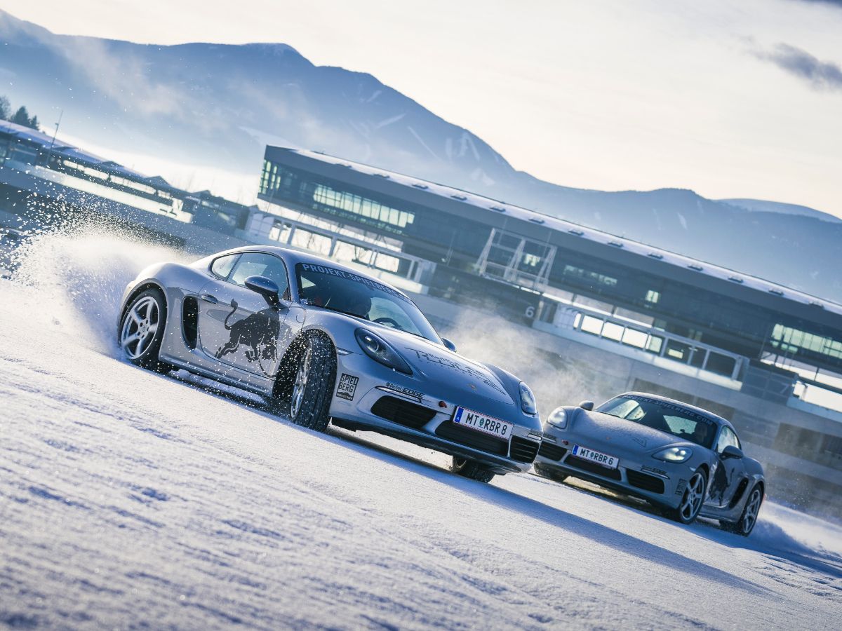 Porsche drifting on a snowy track
