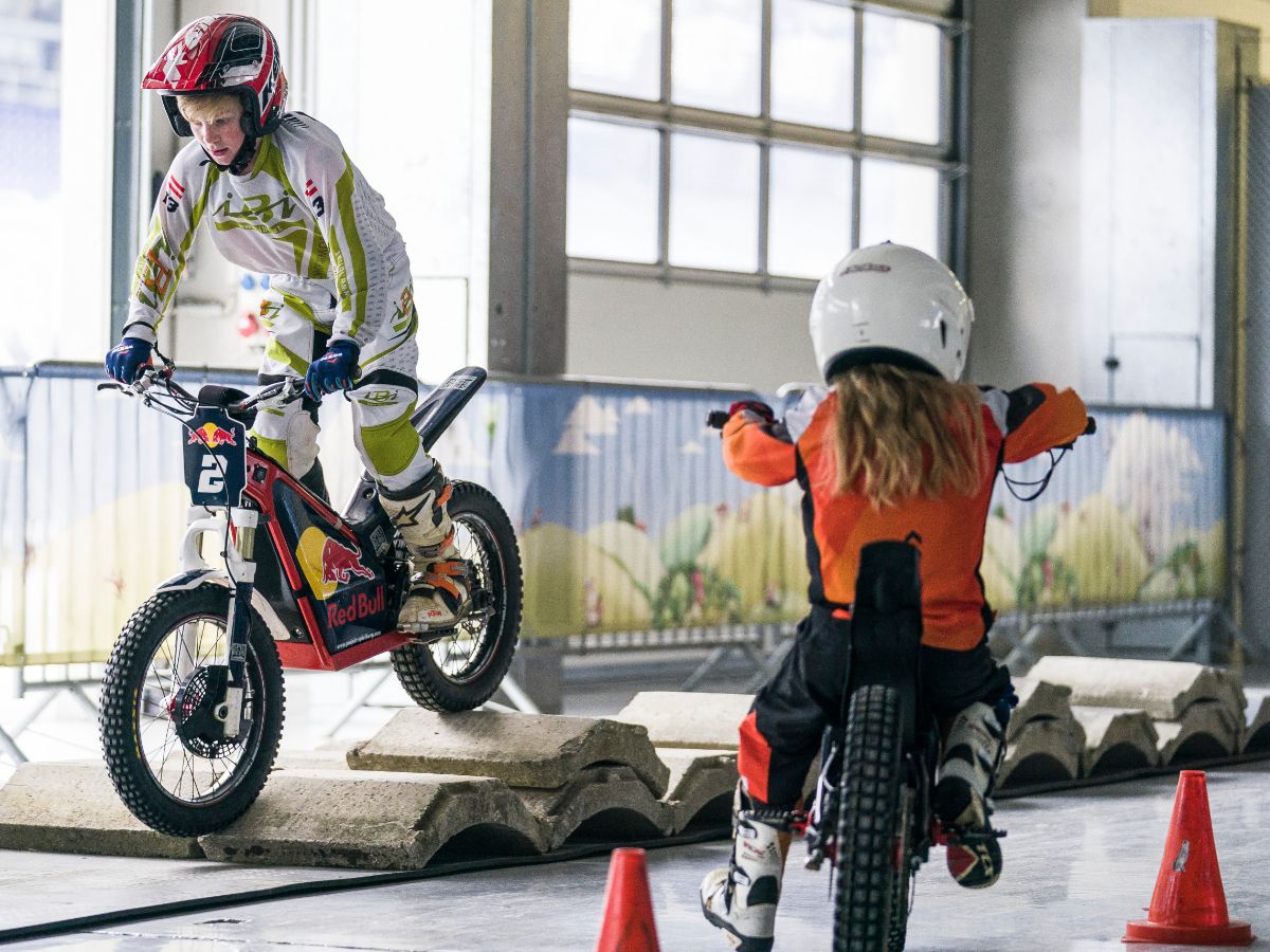 Trial Bikes driving through indoor parcour